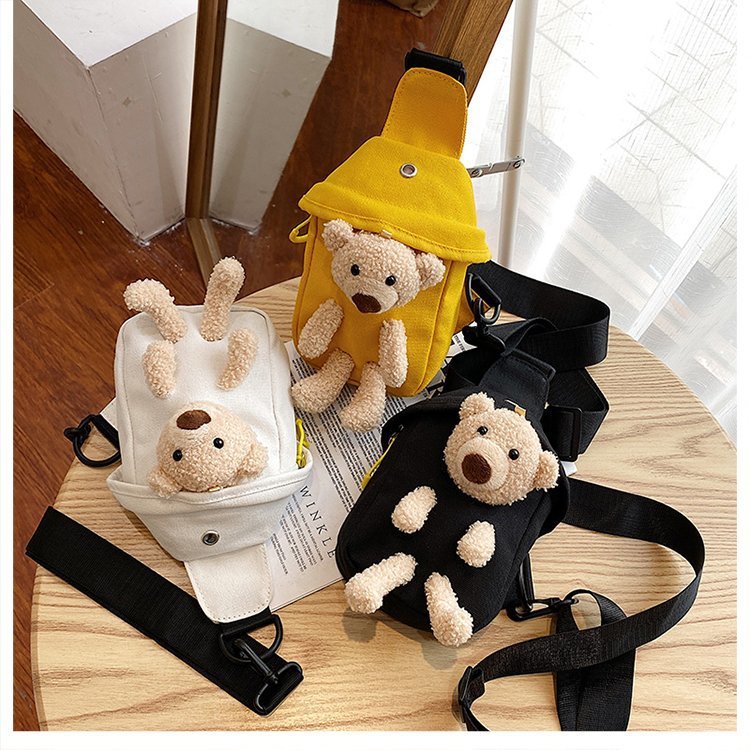 <font dir="auto" style="vertical-align: inherit;"><font dir="auto" style="vertical-align: inherit;">Popular Bear Canvas Bag 2025 New Trendy Shoulder Crossbody Bag Cartoon Ins Cute Bag Custom Packaging</font></font>