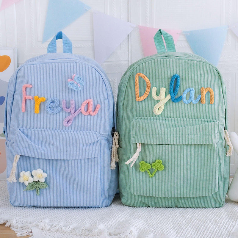 <font dir="auto" style="vertical-align: inherit;"><font dir="auto" style="vertical-align: inherit;">2025 cross-border explosions primary school student schoolbag custom cute men's and women's shoulder corduroy children's backpack factory wholesale</font><