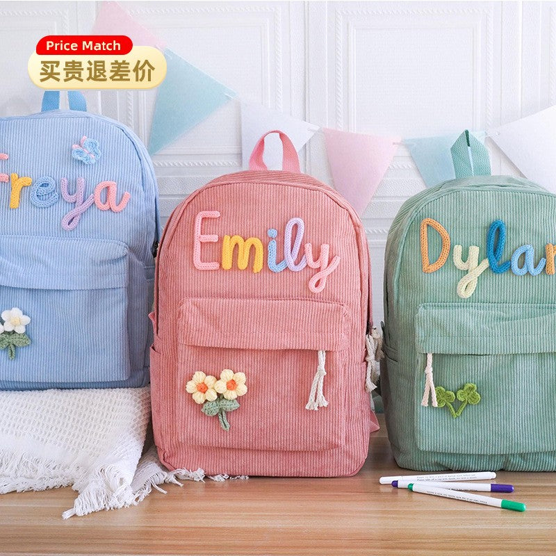 <font dir="auto" style="vertical-align: inherit;"><font dir="auto" style="vertical-align: inherit;">2025 cross-border explosions primary school student schoolbag custom cute men's and women's shoulder corduroy children's backpack factory wholesale</font><