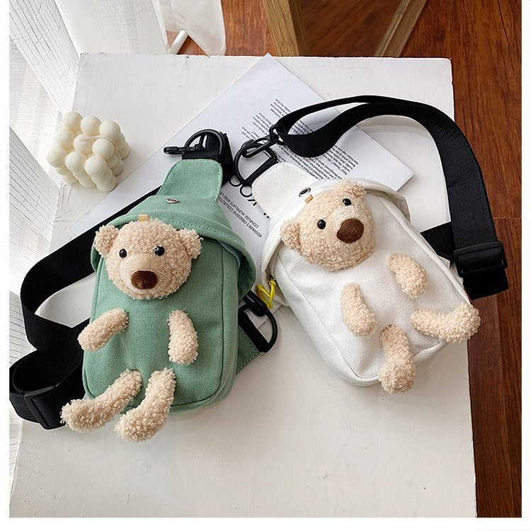 <font dir="auto" style="vertical-align: inherit;"><font dir="auto" style="vertical-align: inherit;">Popular Bear Canvas Bag 2025 New Trendy Shoulder Crossbody Bag Cartoon Ins Cute Bag Custom Packaging</font></font>