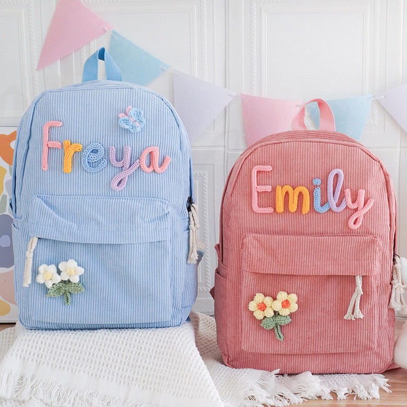 <font dir="auto" style="vertical-align: inherit;"><font dir="auto" style="vertical-align: inherit;">2025 cross-border explosions primary school student schoolbag custom cute men's and women's shoulder corduroy children's backpack factory wholesale</font><